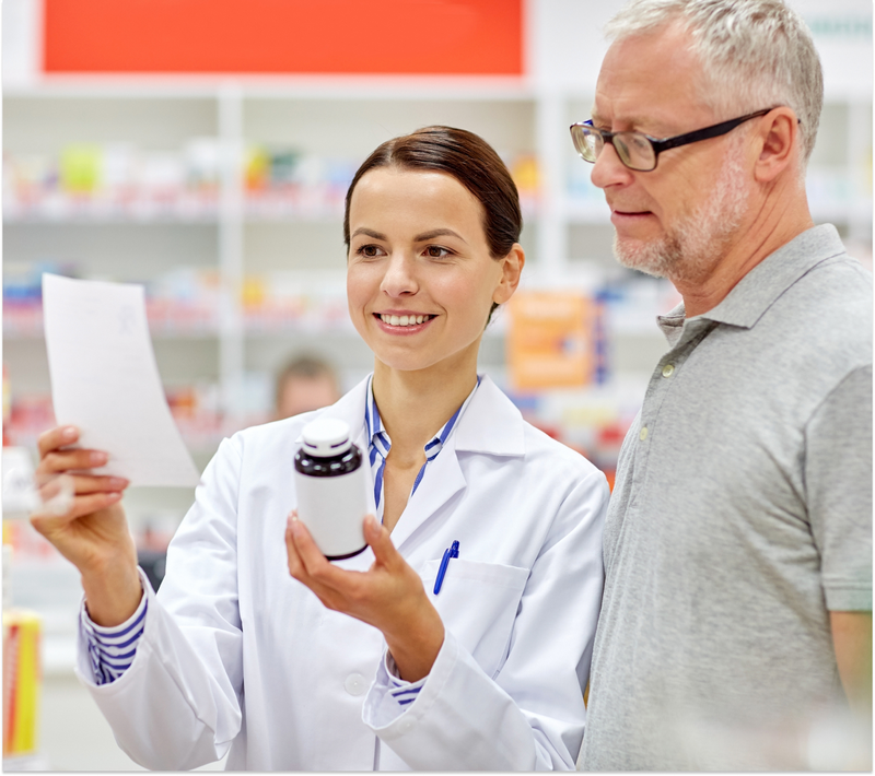 Woman pouring medicine in hand